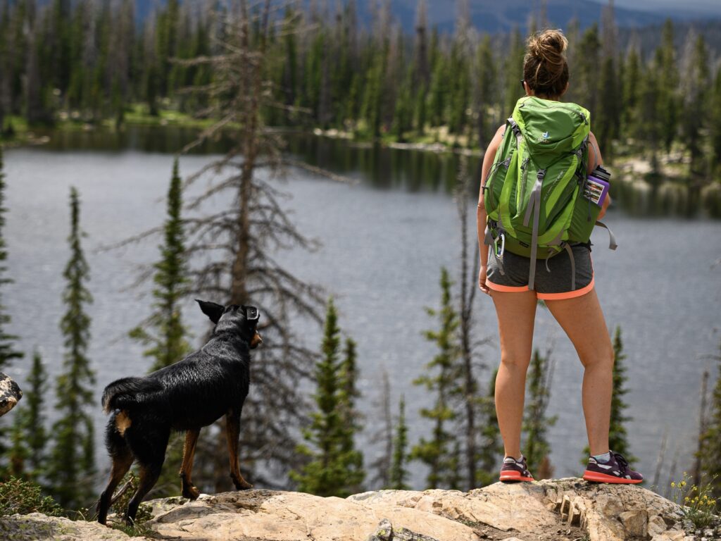 Women hiking with her dog